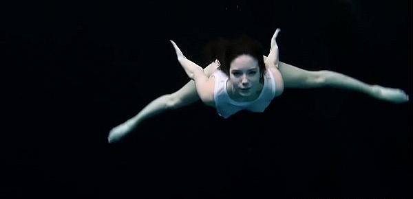 Andrejka swims naked in the pool